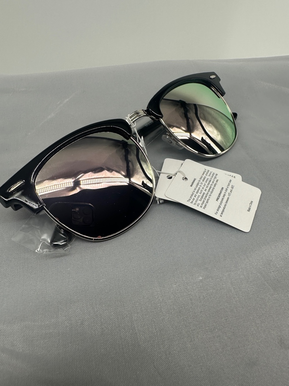 Black clubmaster sunglasses with mirrored lenses